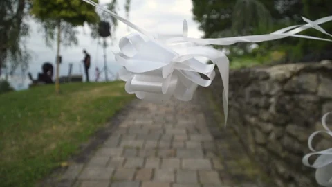 Close up slow motion shot, wedding decoration waving in the wind. Stock Footage 121472566