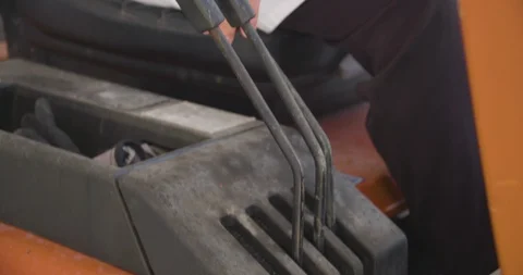 Close up slow motion shot, young man hand drive, operate forklift, 4K. Stock Footage 117191288