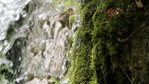 Close up slow motion of spring water flow. Stock Footage 158320521