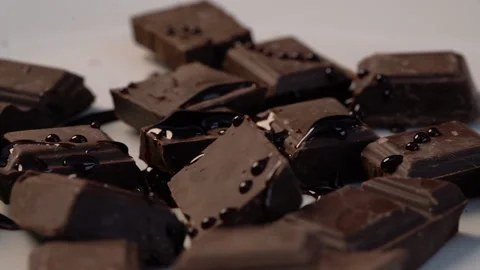 Close up slow-motion turn around chocolate topped with melted chocolate prem Stock-Footage 136210171