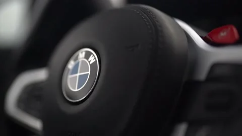 Close slow motion video of bmw steering wheel Stock Footage 180373811