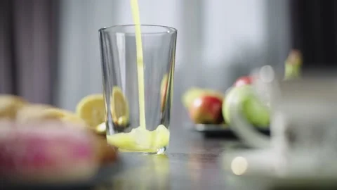 Close up slow motion video of breakfast table with orange juice Stock Footage 236380357
