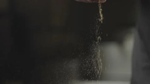 Close-up slow motion video of chef's hand peppering meat. Stock-Footage 234919731