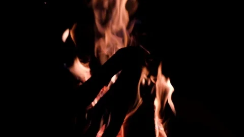 Close up slow motion video of fire burning in the fireplace. Video of fire fl Stock Footage 99726236