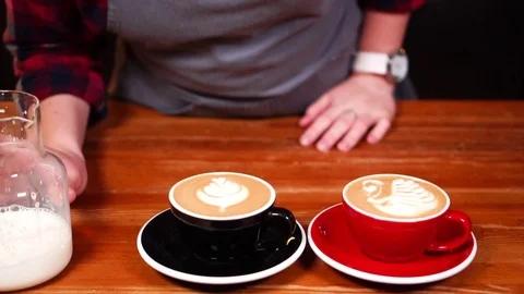 Close up slow motion view on beautiful latte art with milk foam on cappuccino Stock Footage 104515054