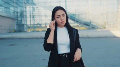 Close up slow motion view of good looking young seductive woman putting on Stock Footage 114245082