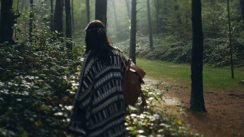 Close up slow motion view of pretty young woman in boho style wear standing in 스톡 동영상 108731856