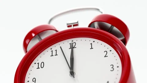 A close up slow motion view of a red alarm clock showing the second hand mo.. Stock Footage 332315603