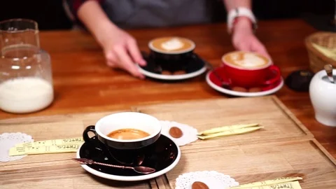 Close up slow motion view on small minimalistic ceramic coffee cups with Stock Footage 104513815