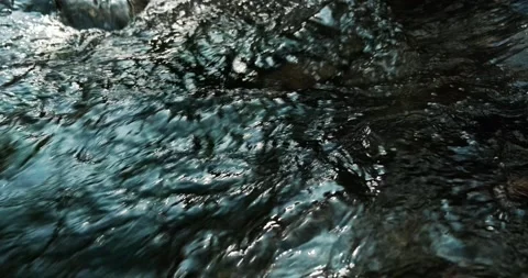 Close up slow motion water flow in a creek. Stock Footage 151848201