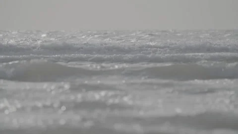 Close-up of slow motion waves in the North Sea Stock Footage 169645199