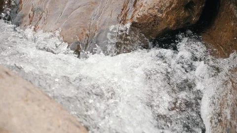 Close up Slow motion of Wild Mountain River Abundant Clear Stream Stock Footage 152553105