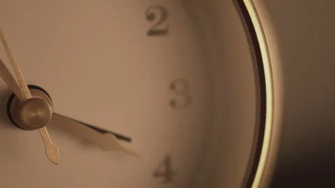Close up, slow moving clock on a rotating platform. Stock Footage 199756001