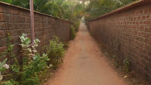 Close slow moving shot of narrow walking street Stock Footage 151967597
