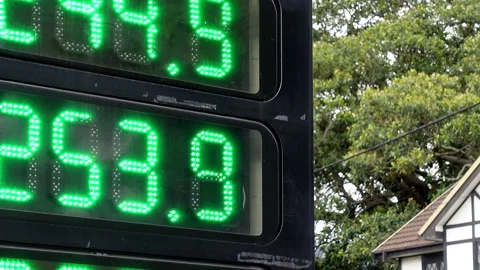 Close-Up Slow Pan Across High Petrol and Diesel Price Sign Stock Footage 331042254