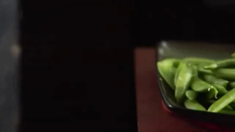 Close-up, slow pan from left to right over Asian vegetables Stock-Footage 98247469