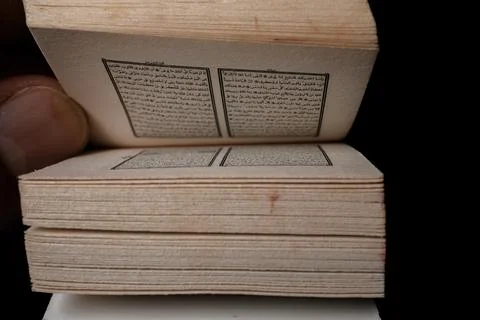 Close-up small Arabic book with stacked pages Stock Photos