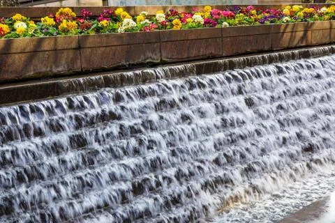 Close up of a small artificial waterfall Stock Photos