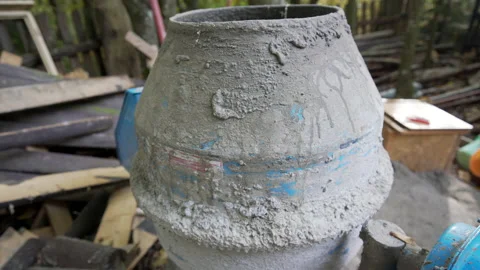 Close up of small cement mixer, dried concrete Stock Footage 158978292