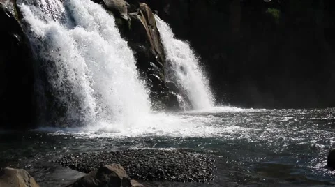 Close up of a small clear, pure, Icelandic waterfall Stock Footage 59882751