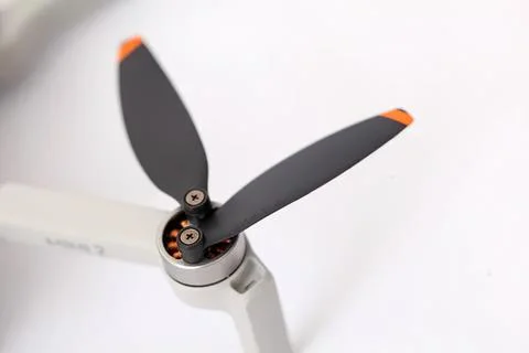 Close-up of small drone propeller with orange tips Stock Photos
