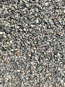 Close-up of small gray pebbles, showcasing texture Foto stock