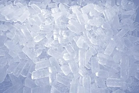 Close up small iced cube in a large tray Photos