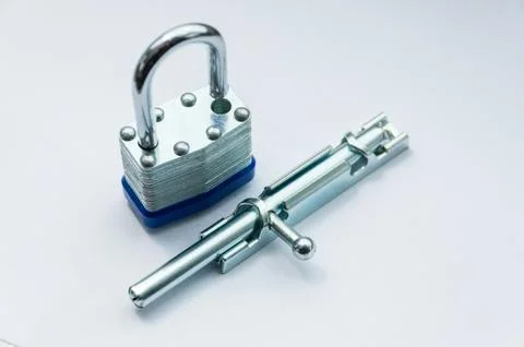 Close-up small padlock and latch for a door Stock Photos