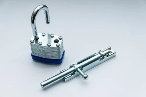 Close-up small padlock and latch for a door Stock Photos