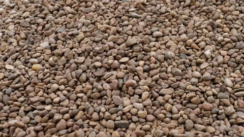 Close Up of Small Pebbles on Ground Stock Footage 344873796