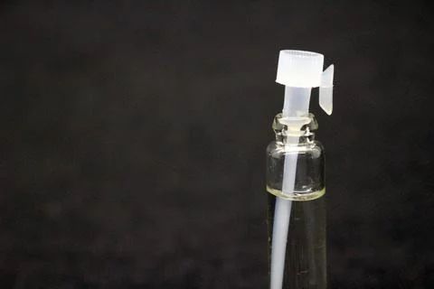 Close up small perfume bottle Stock Photos