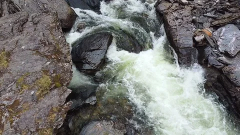Close Up of Small Rapid River and Wet Rocks in Voss - Norway 2.7K Aerial Stock Footage 258290717
