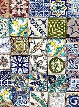 Close up of small, square, intricately patterned tiles, Fez, Morocco Stock Photos