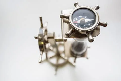 Close up small vintage compass in shape of steer Stock-Fotos