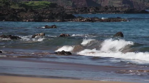 Close up of small waves breaking on tropical south Maui Wailea. Stock Footage 134848719