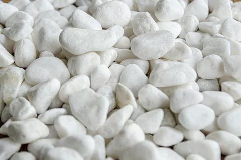 Close up of small white rocks with customizable space for text or messages Stock Photos
