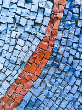 Close-up of a smalt mosaic texture on which a red line Stock Photos
