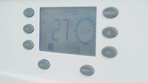 Close up of smart control panel of gas boiler with increasing temperature for Stock Footage 254514752