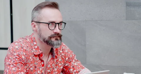 Close up smart handsome old man mustache relax with tablet in outdoor coffee  Stock Footage 150604738