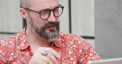 Close up smart handsome old man mustache vdo call with family in outdoor coffee  Stock Footage 150612816