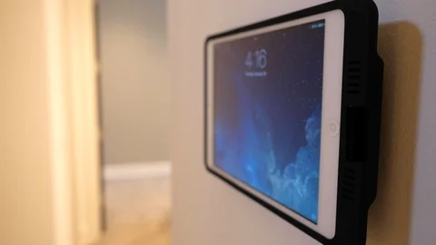 Close-up of smart home system on iPad on home wall. Stock Footage 98013888