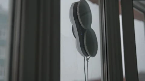Close-up of smart home technology concept of automated cleaner robot moving on Stock Footage 342770057