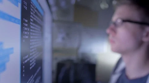 Close-up of smart man evaluating the server data Video stock 72477037