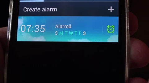 Close up smart phone screen setting clock alarm wake up call, time sleep hour 4K Stock Footage 61543681