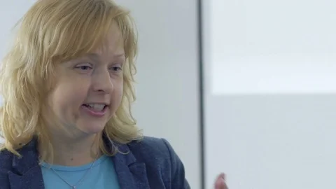 Close-up of smart student discussing with a cheerful lecturer Stock-Footage 69933252