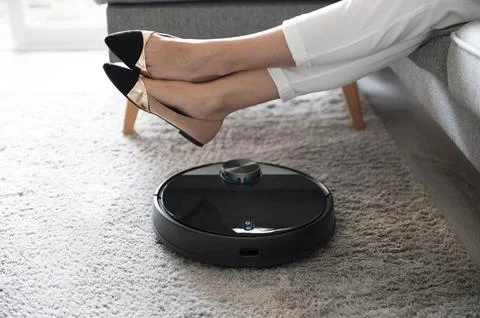 Close up smart vacuum cleaner Stock Photos