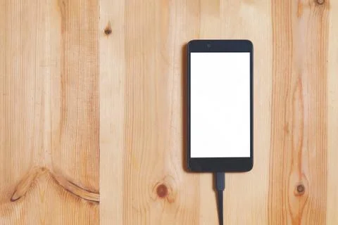Close up smartphone and data connecting cable for transfer and Charge battery Stock Photos