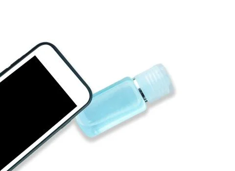 Close-up smartphone and small plastic bottle of sanitizer antibacterial gel,  Stock Photos