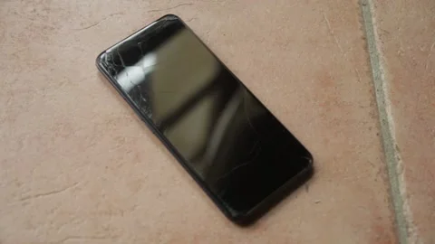 Close up of  a Smartphone With Broken Glass Screen Stock Footage 170898757