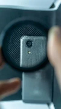 Close-Up of Smartphone Camera Lens Through a Black Circular Filter Stock Photos